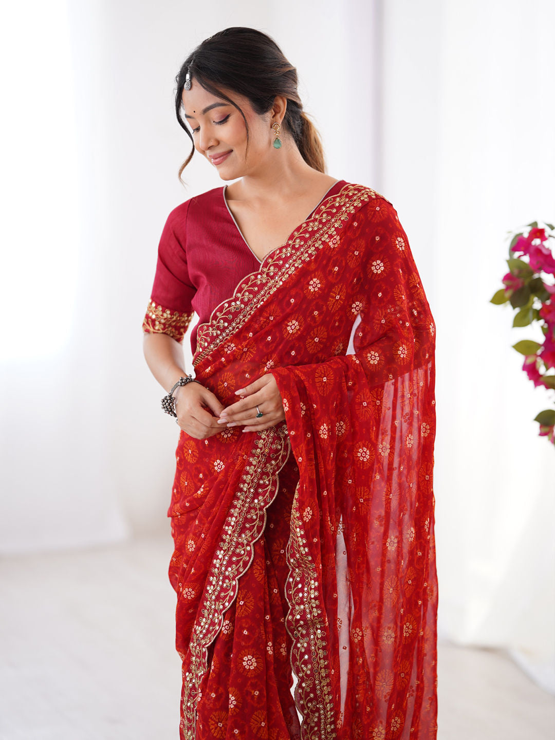 Georgette Party Wear Saree
in Red and Maroon with Printed work