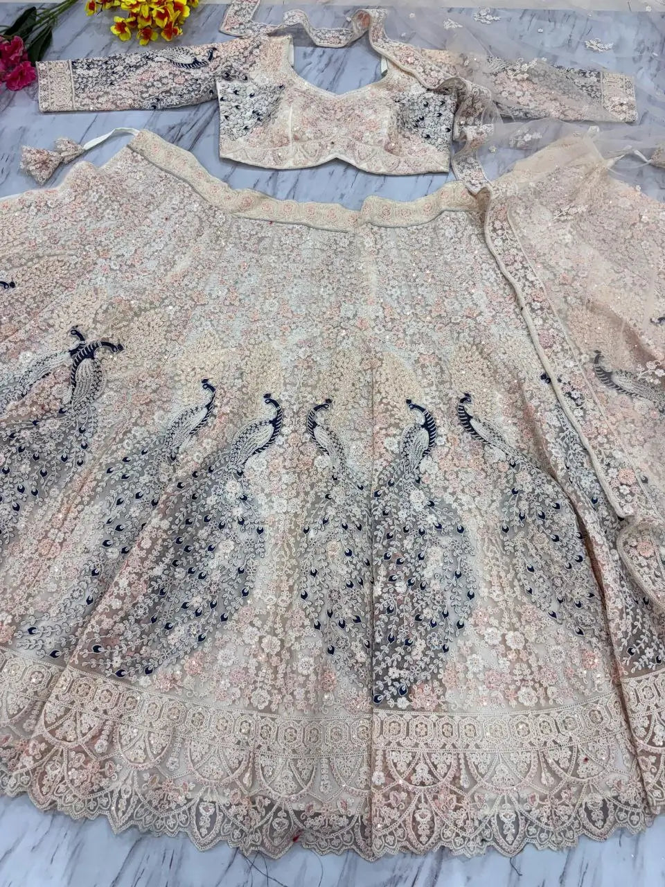 Premium Soft Butterfly Net Lehenga Embellished With Beautiful Multy Thread Embroidery Work
