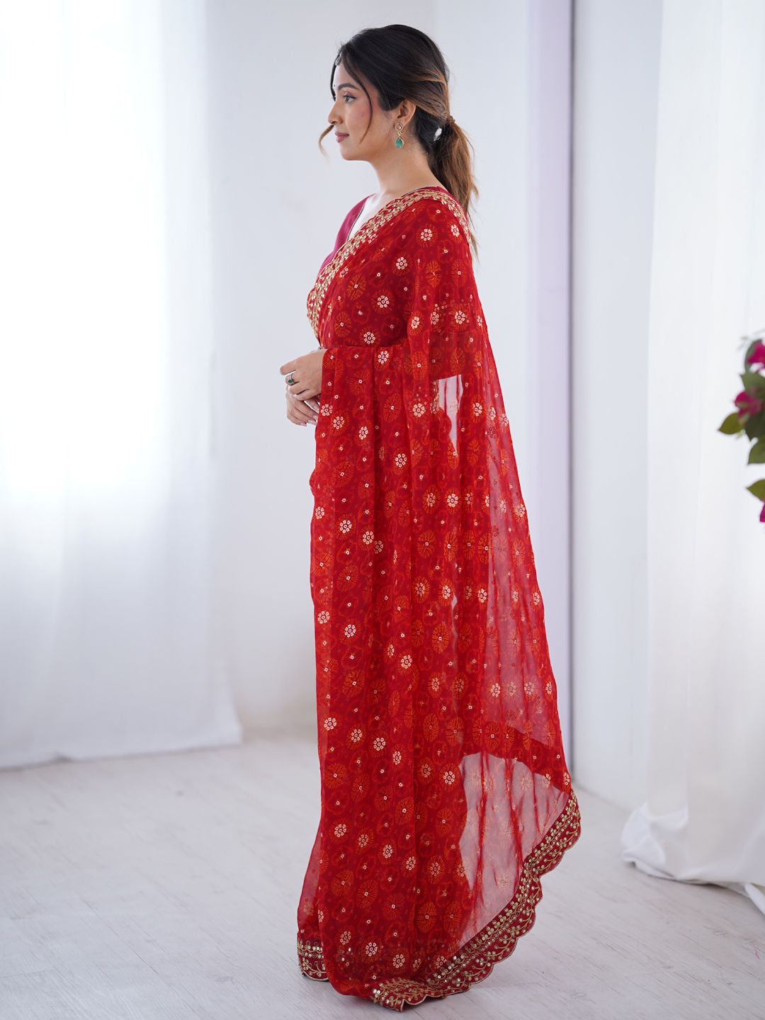 Georgette Party Wear Saree
in Red and Maroon with Printed work